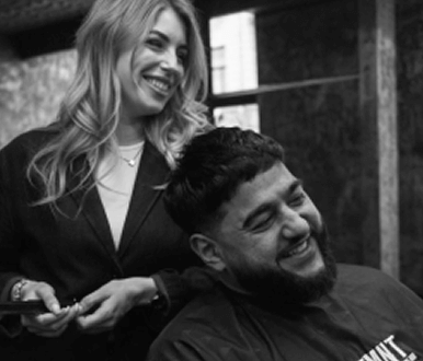 Barber chatting with a client